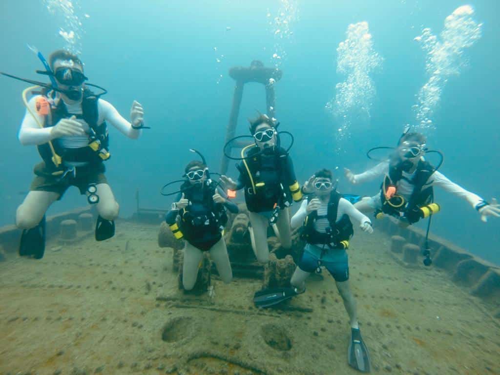 Family scuba diving in Baja California Sur in the Sea of Cortez